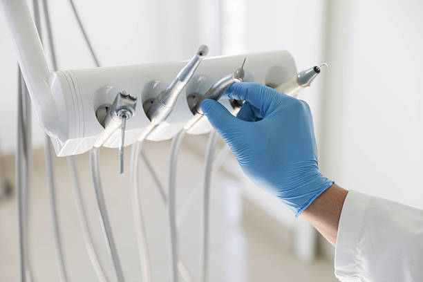 Professional Tooth Extraction technician working in Lexington, TX